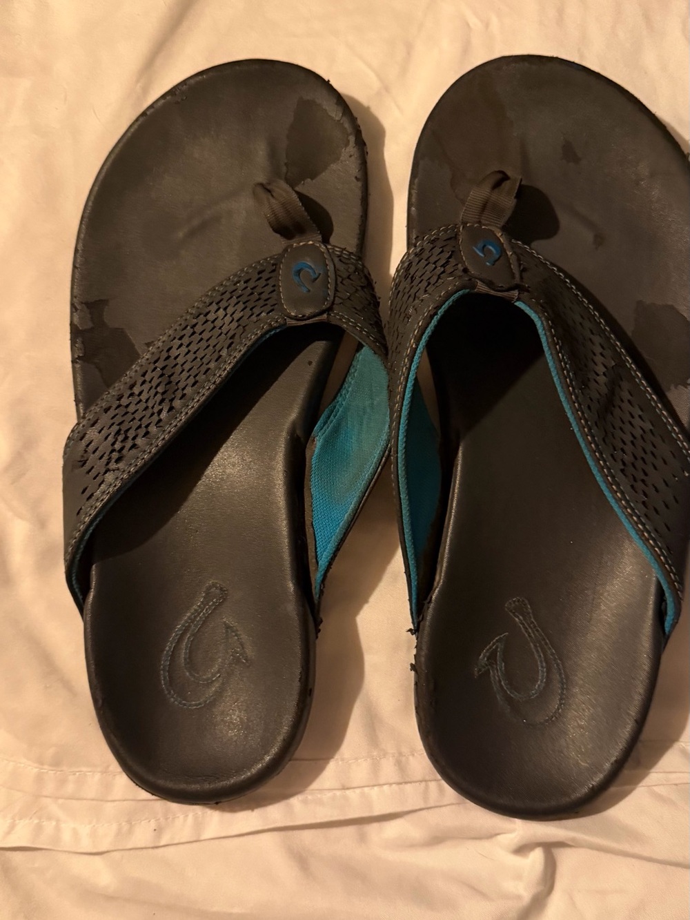 OluKai Men's Black Flip-Flops with Teal Accents